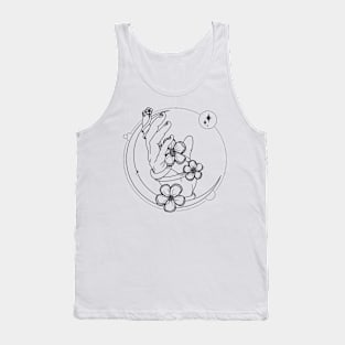 hand holding flower on a crescent moon Tank Top